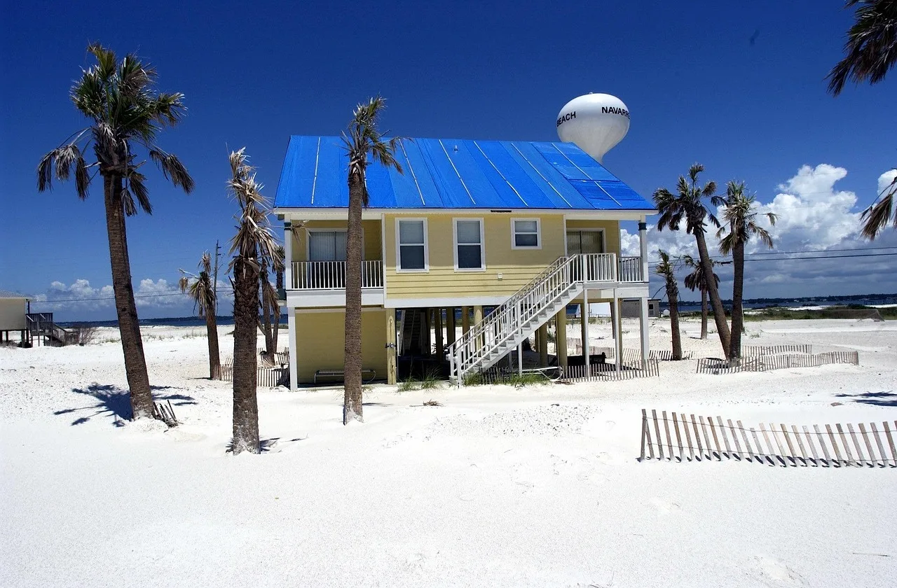 pensacola, florida, sky, house, home, palms, palm trees, sand, clouds, beach, sea, ocean, water, nature, outside, blue home, blue house, blue sand, pensacola, pensacola, pensacola, pensacola, pensacola, florida. Florida vs California vacation lodging: who regulates what